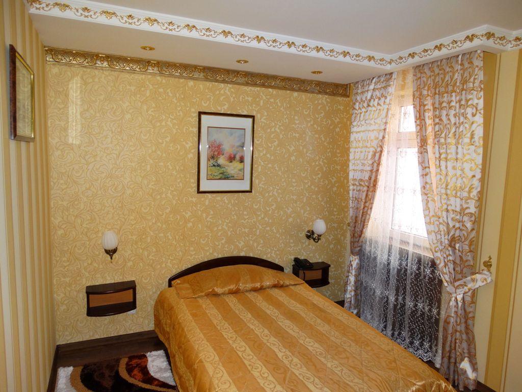 Hotel Papillon Tasjkent Rum bild